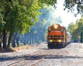 Wine train in Napa Valley on tracks with hazy background Royalty Free Stock Photo