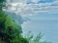 NaPali Majesty: Rugged Cliffs and Coastal Greenery under Azure Skies Royalty Free Stock Photo