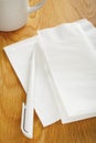 Napkin or Serviette and Pen on Table Royalty Free Stock Photo