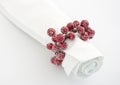 Napkin with xmas berry napking ring Royalty Free Stock Photo