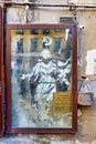 Naples Campania Italy. Famous street art by Banksy. Madonna con revolver (Mary with gun