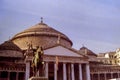 NAPLES, ITALY, 1986 - The colonnade and the church of S. Francesco di Paola are the background to the equestrian statue of