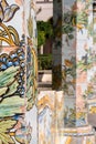 Colourful tiled pillars and bench in the cloister garden at the Santa Chiara Monastery in Via Santa Chiara, Naples Italy.