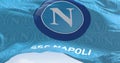 The flag of SSC Napoli waving in the wind on a clear day