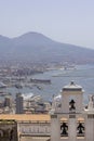 View of the city on Gulf of Naples and monastery Certosa di San Martino from Castel Sant\'Elmo. Volcano Mount Vesuvius in a