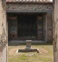 NAPLES, ITALY- JUNE, 13, 2019: the ruins of a house and courtyard in the ancient roman city of pompeii