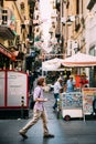 Naples, Italy. Young Caucasian Man Tourist Walking At Famous Via Toledo Street