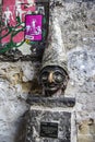 Statue with the face of Pulcinella in Naples, Italy