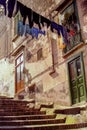 NAPLES, ITALY, 1979 - A typical Naples street with clothes hanging out to dry between the houses Royalty Free Stock Photo