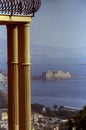 NAPLES, ITALY, 1988 - From Vomero a balcony supported by two columns overlooking the Gulf of Naples, Vesuvius and Castel dell`Ovo. Royalty Free Stock Photo