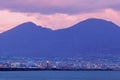 Naples Lighthouse and Vesuvius at sunset Royalty Free Stock Photo
