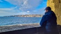 Naples - Man with panoramic view from Castel dell Ovo on the city of Naples, Italy, Europe Royalty Free Stock Photo