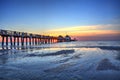 Naples Pier on the beach at sunset Royalty Free Stock Photo