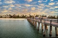 Naples Pier on the beach at sunset Royalty Free Stock Photo