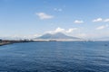 Photograph taken in the city of Naples, Italy, featuring a view of Mount Vesuvius and the Naples sea