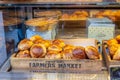 Naples, Sfogliatelle frolle in the box with pastiera in the background and curly sfogliatella to the side. Royalty Free Stock Photo