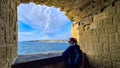 Naples - Woman with panoramic view from Castel dell Ovo on the city of Naples, Italy, Europe Royalty Free Stock Photo