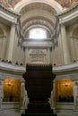 Napoleon Bonaparte Tomb in Hotel des invalides surrounded by tourists. Napoleon is a former French Emperor, and a symbol of French