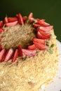 Napoleon cake with fresh strawberries on top served on a white plate with blurred background. Dessert time Royalty Free Stock Photo