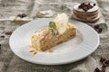 Napoleon Dessert or Mille-Feuilles on Rustic Tablecloth Background