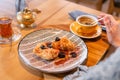 Napoleon dessert with salted caramel and prunes, in the original serving. Breakfast, pleasant morning, the beginning of