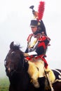Napoleonic war soldier - reenactor rides a horse
