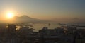 Napoli, Italy. Wonderful landscape on the Vesuvio volcano, the bay and the harbor during the sunrise