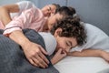 Cute family sleeping together in one bed Royalty Free Stock Photo