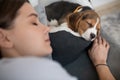 A young woman lying next to her puppy and having a nap Royalty Free Stock Photo