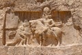 Naqsh-e Rustam, Iran. Rock relief of the triumph of Shapur I over the Roman emperors Valerian and Philip the Arab Royalty Free Stock Photo