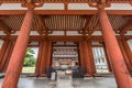 Yakushi-Ji temple. Jokoro incense burner at Chumon gate, Kondo (Main hall) in the back.