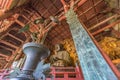 Wide angle view of The great Buddha (Daibutsu) at Daibutsuden Hall in Todai-ji Temple, detail of copper ornaments and wooden ceili