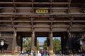 NARA, JAPAN - JAN 30, 2018: Tourists walking in entrance of Todaiji Nandaimon giant temple door in Nara