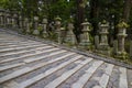 Nara - Japan, May 31, 2017: Row of many stone lanterns that lead