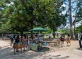 NARA, JAPAN - MAY 31, 2016: Tourists feeding deer cookie to the