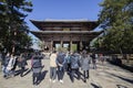 Tourists walking in entrance of Todaiji Nandaimon giant temple door in Nara