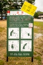 NARA, Japan, 29/10/2019. Warning sign in Nara Park regarding deer`s behaviour and mating season.