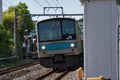 The Nara Line JR train passes through the station. Kyoto Japan