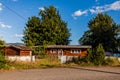 NARAMATA, CANADA - JULY 5, 2020: residential arei in small town house and white fence