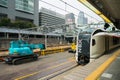 Narita Express train at Shinjuku station with Cocoon tower background Royalty Free Stock Photo