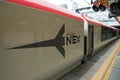 Narita Express train at Shinjuku station with Cocoon tower background, Tokyo. Royalty Free Stock Photo