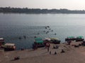 The Narmada river bank beautiful view. Boats and people.