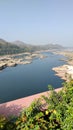 Narmada river with mountain range in background