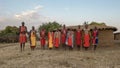NAROK, KENYA- AUGUST, 28, 2016: wide view of a group of maasai women and men singing