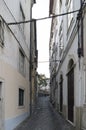 Narrow alley are cobblestone floor in the center of the city of coimbra