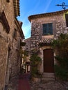 Narrow alley in the historic center of small medieval town Eze Village at the French Riviera.