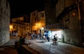 Narrow Alley With Illuminated Ancient Buildings In The Ancient Fortress Of Medieval City Carcassonne In Occitania, France