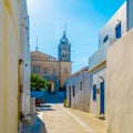 Narrow alley leading to the ancient church in Lefkes, Greece Royalty Free Stock Photo