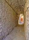 Narrow alley at the medieval castle village of Mesta in Chios island , Greece Royalty Free Stock Photo