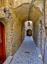 Narrow alley at the medieval castle village of Mesta in Chios island , Greece Royalty Free Stock Photo